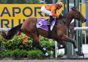 Barend Vorster guides Trudeau to an easy victory on Sunday.<br>Photo by Singapore Turf Club